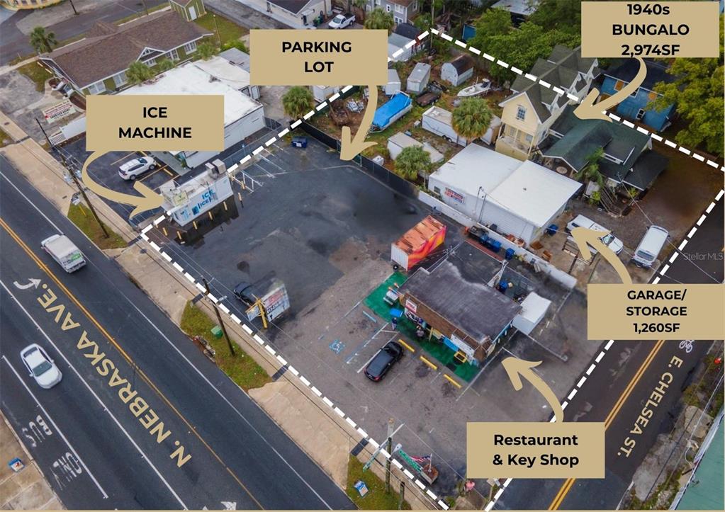 An aerial view shows a commercial property lot with a restaurant, bungalow, and parking area — 4330 N NEBRASKA AVENUE, TAMPA, FL
