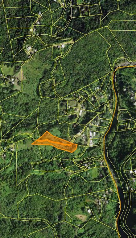 This is an aerial map showing a highlighted parcel of land surrounded by wooded terrain — 0 CARR 174 KM 14.3 SECTOR LAS CHORRERAS, BAYAMON, PR