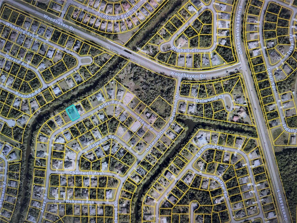 This is an aerial map showing a residential neighborhood with a highlighted vacant lot — ARLEY ROAD, NORTH PORT, FL