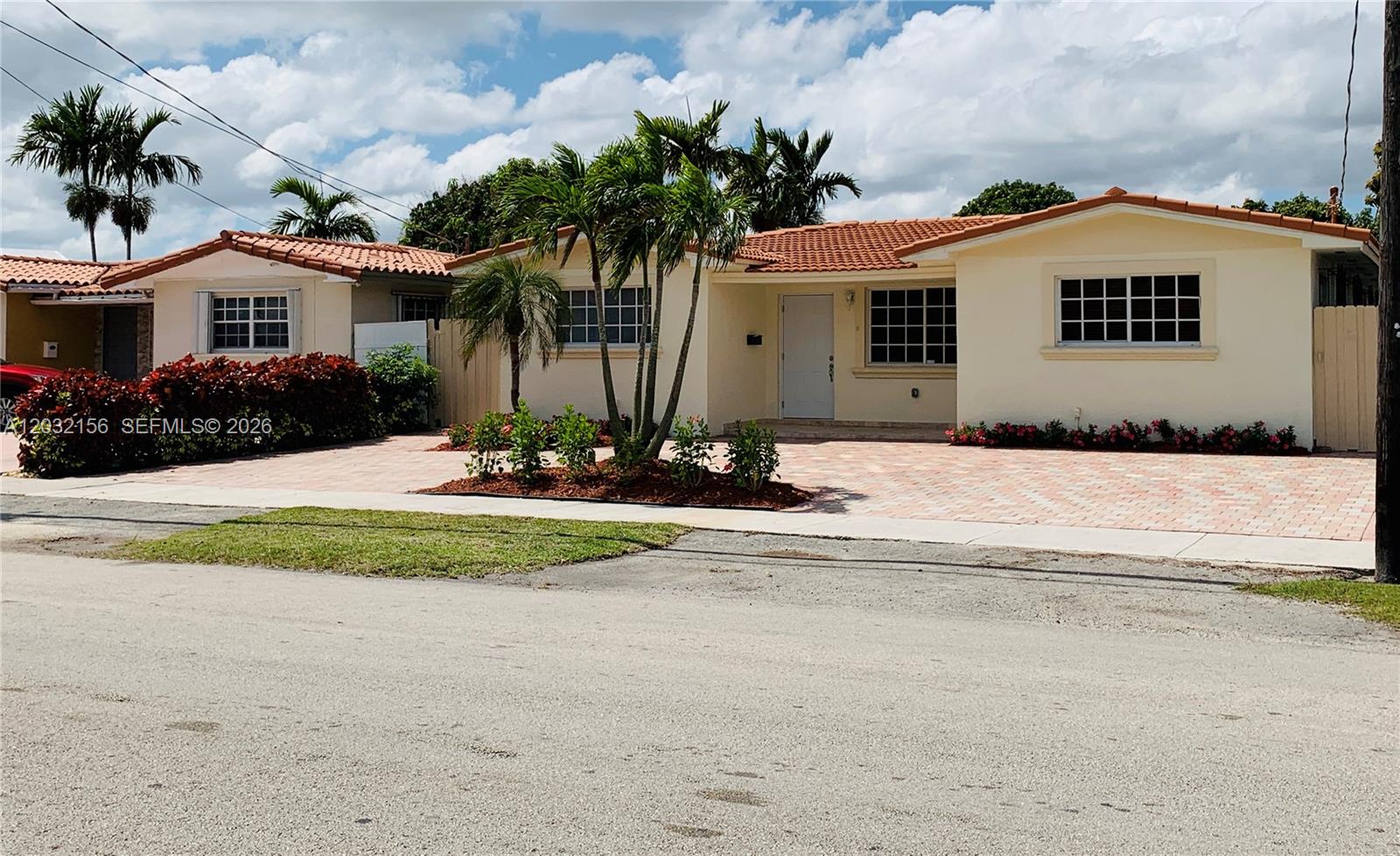 A single-story house with a tiled roof, light-colored exterior, and a paved driveway — 4120 SW 69 Ave, Miami FL 33155, MIAMI, FL