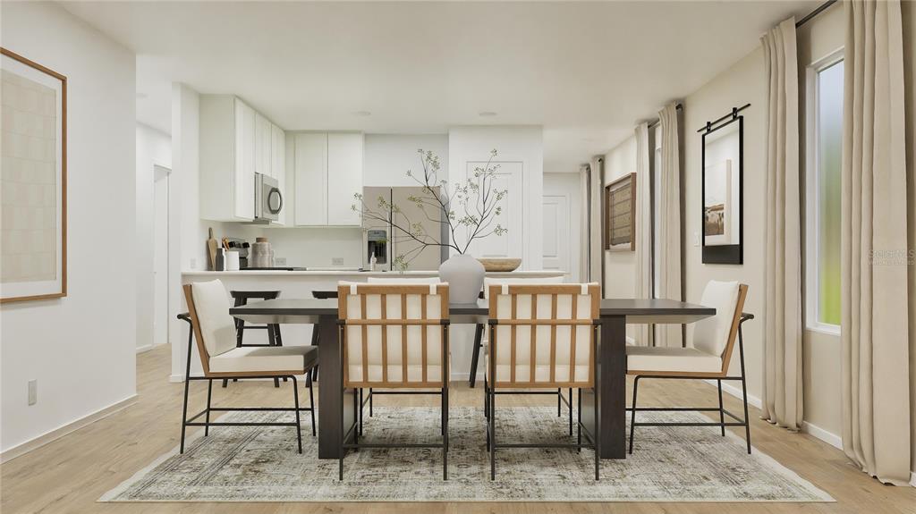 This rendering shows a dining area with a dark table, four chairs, and an open kitchen — 270 CERAMIC LANE, GROVELAND, FL