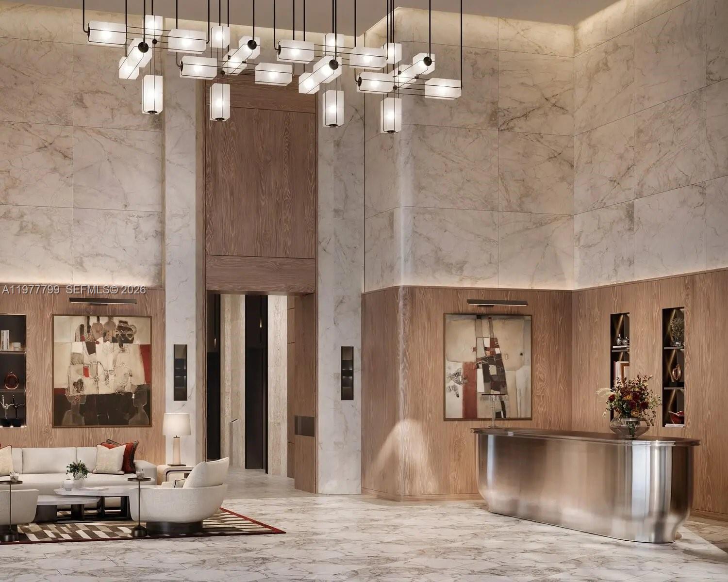 This rendering shows a modern lobby with marble walls, wood paneling, and a metallic reception desk — 2 Al Mustaqbal Street # 803, Dubai, FL