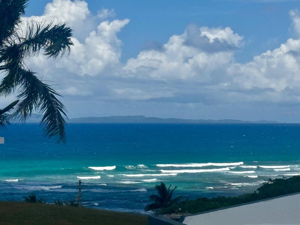 A view of the ocean and coastline from an elevated outdoor perspective — Calle 21, Lote 755, BARRIO SANTA MARIA, VILLA BORINQUEN, VIEQUES, PR
