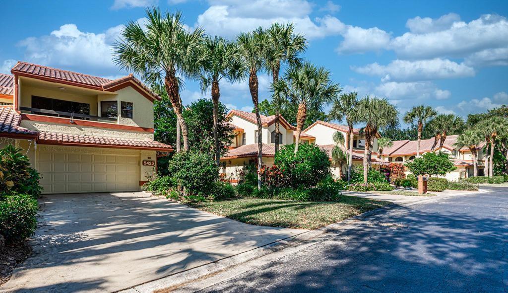 A two-story residential building with a beige stucco exterior, tile roof, and attached garage — 5425 10th Fairway Drive # 3, Delray Beach FL 33484, DELRAY BEACH, FL
