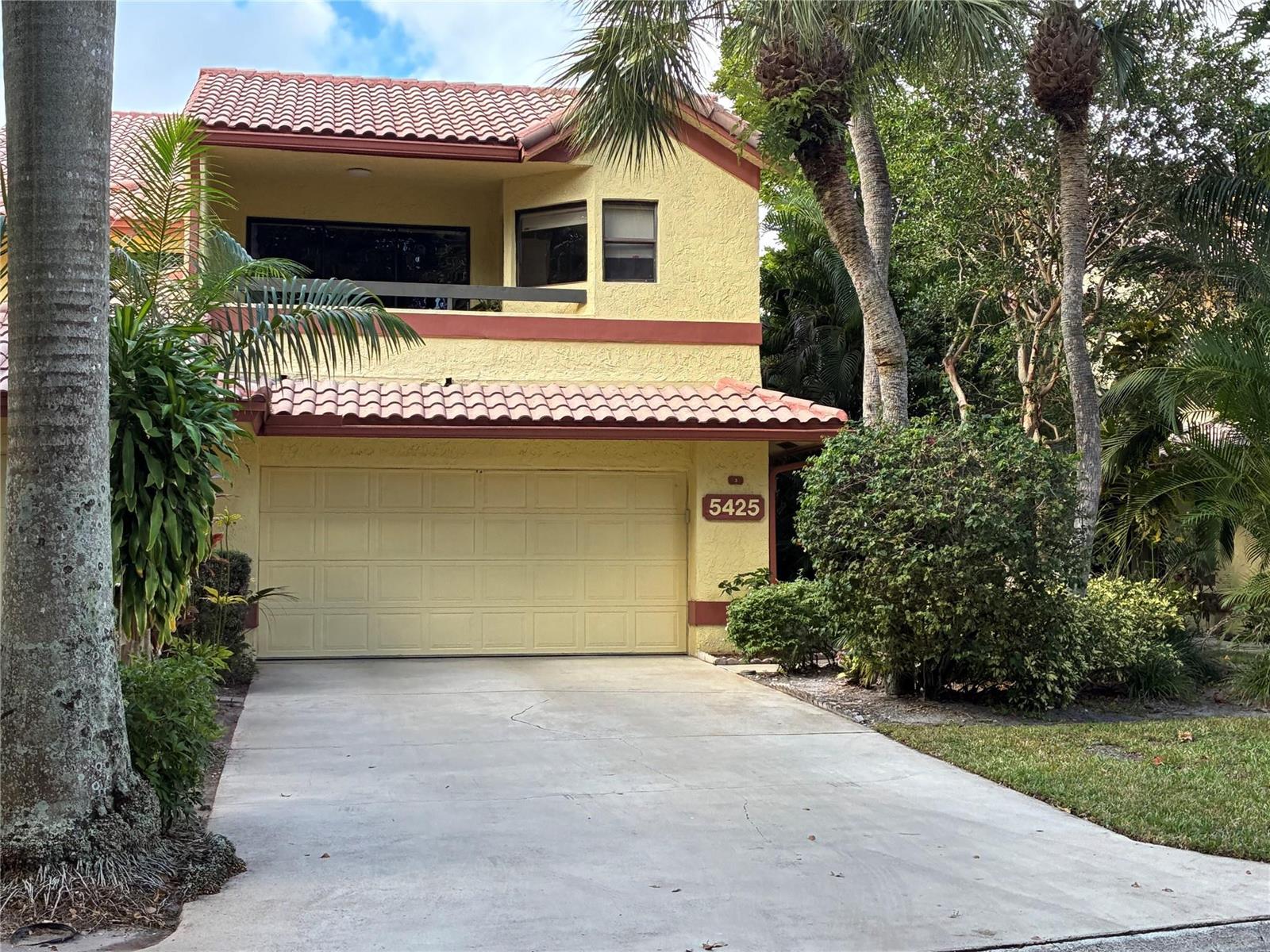 A two-story yellow stucco house with a tile roof and a two-car garage — 5425 10th Fairway Drive # 3, Delray Beach FL 33484, DELRAY BEACH, FL