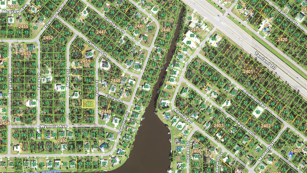 This is an aerial map showing residential lots, streets, and a waterway — 343 YULE STREET, PORT CHARLOTTE, FL