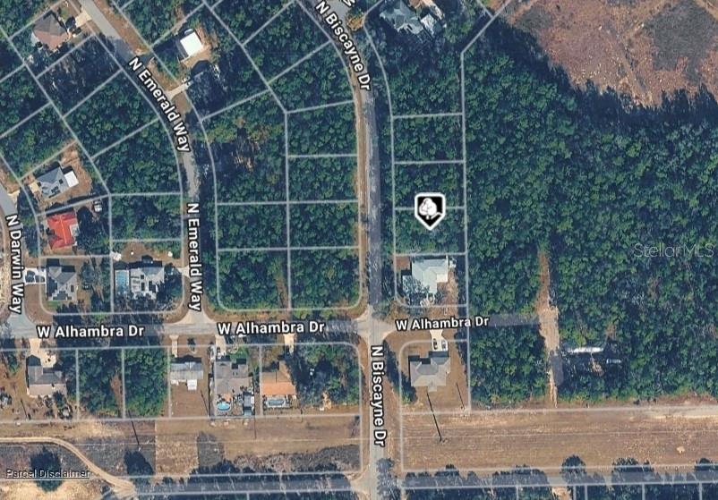 This is an aerial map view showing a vacant residential lot located on a street corner — 10049 N BISCAYNE DRIVE, CITRUS SPRINGS, FL