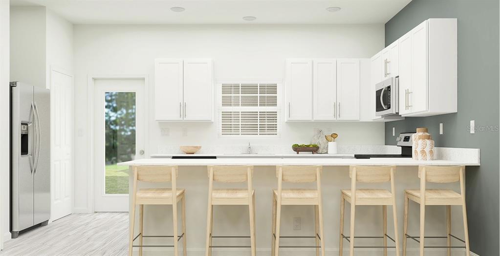 This is a digital rendering of a modern kitchen featuring white cabinets and a breakfast bar — 3774 LONZALO WAY, NEW PORT RICHEY, FL