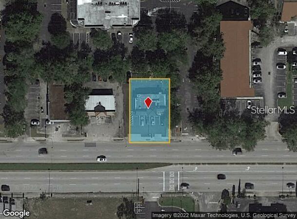This is an aerial map view showing a commercial property highlighted in blue — 507 W VINE STREET, KISSIMMEE, FL