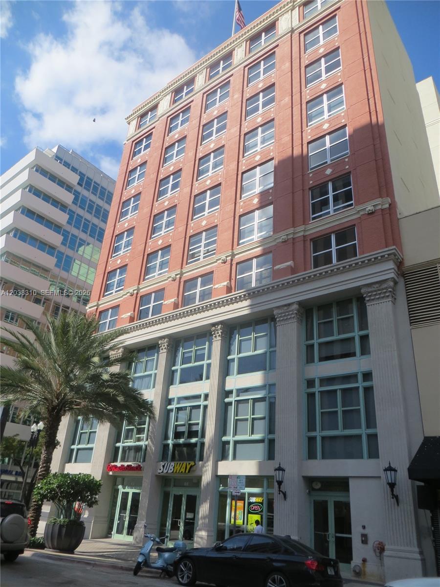 A multi-story brick building with a Subway restaurant on the ground floor — 111 E Flagler St # 503, Miami FL 33131, MIAMI, FL