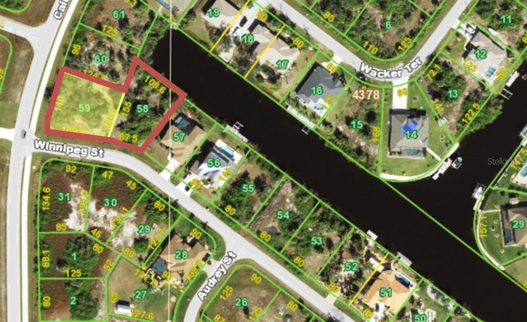This is a satellite map showing residential lots, streets, and a canal — 9864 WINNIPEG STREET, PORT CHARLOTTE, FL