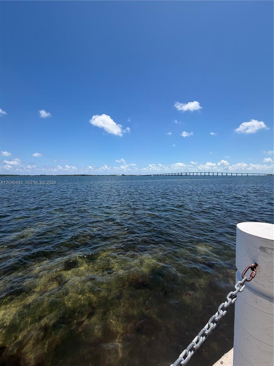 A view of a body of water with a bridge in the distance — 1420 Brickell Bay Dr # 1005C, Miami FL 33131, MIAMI, FL