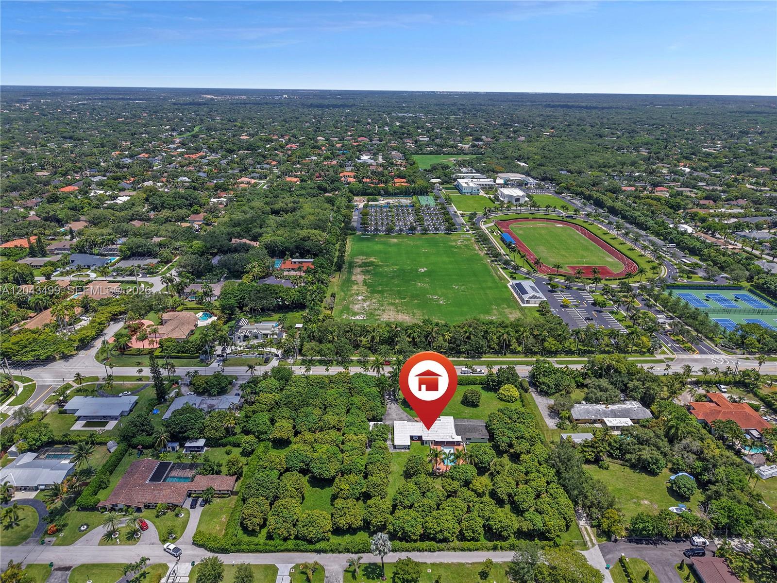 An aerial view shows a single-story house with a pool surrounded by dense trees — 8000 SW 184th St, Cutler Bay FL 33157, CUTLER BAY, FL