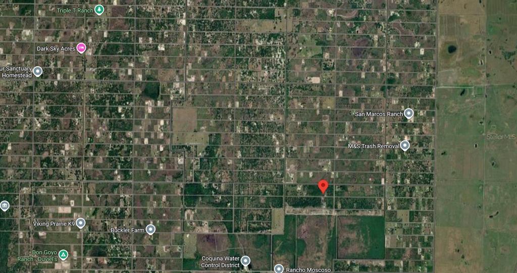 This is a satellite map view showing a rural area with a red location pin — 16171 NW 254TH STREET, OKEECHOBEE, FL