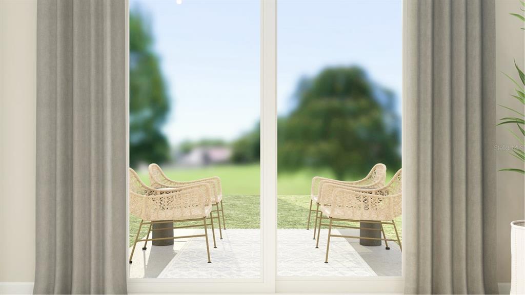 This is a digital rendering of a patio viewed through a sliding glass door — 3236 NAMASTE DRIVE, CLERMONT, FL