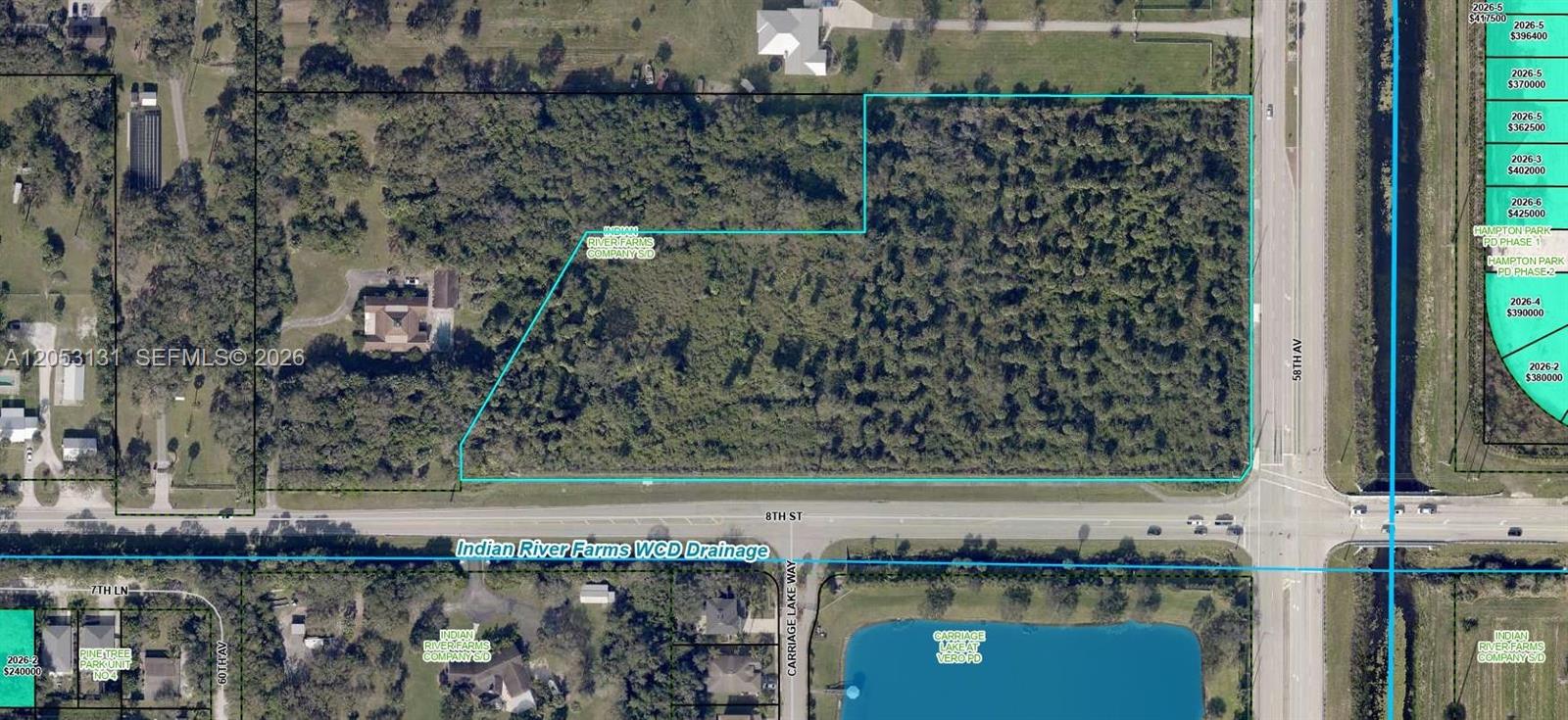 An aerial map shows a wooded, rectangular plot of land bordered by roads and canals — 5992 8th St, Vero Beach FL 32968, VERO BEACH, FL