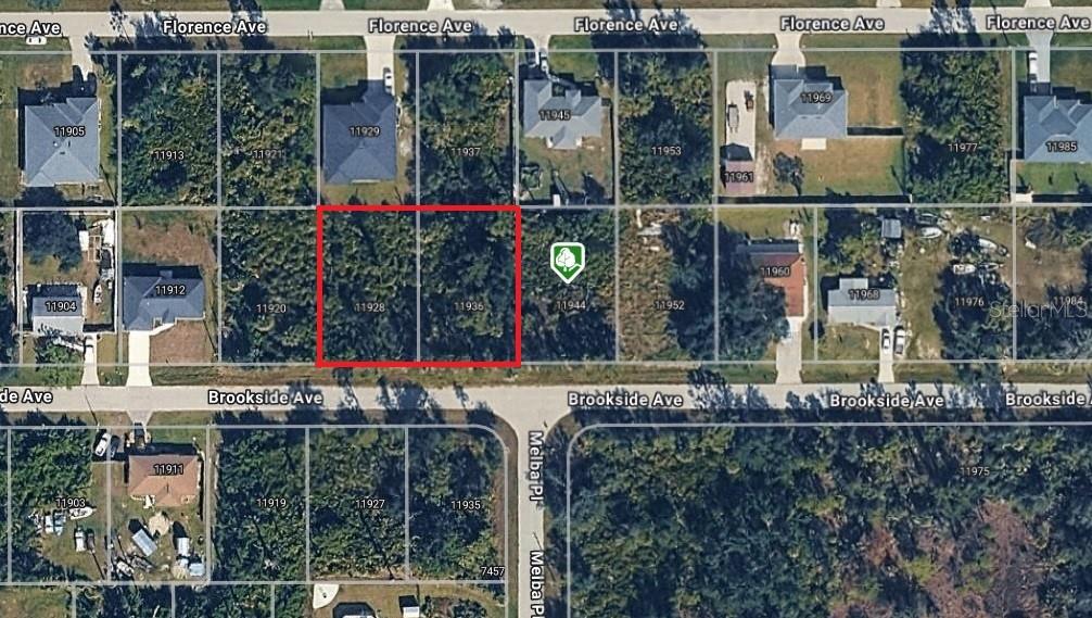 This is an aerial map showing a vacant, wooded residential lot outlined in red — 11936 BROOKSIDE AVENUE, PORT CHARLOTTE, FL