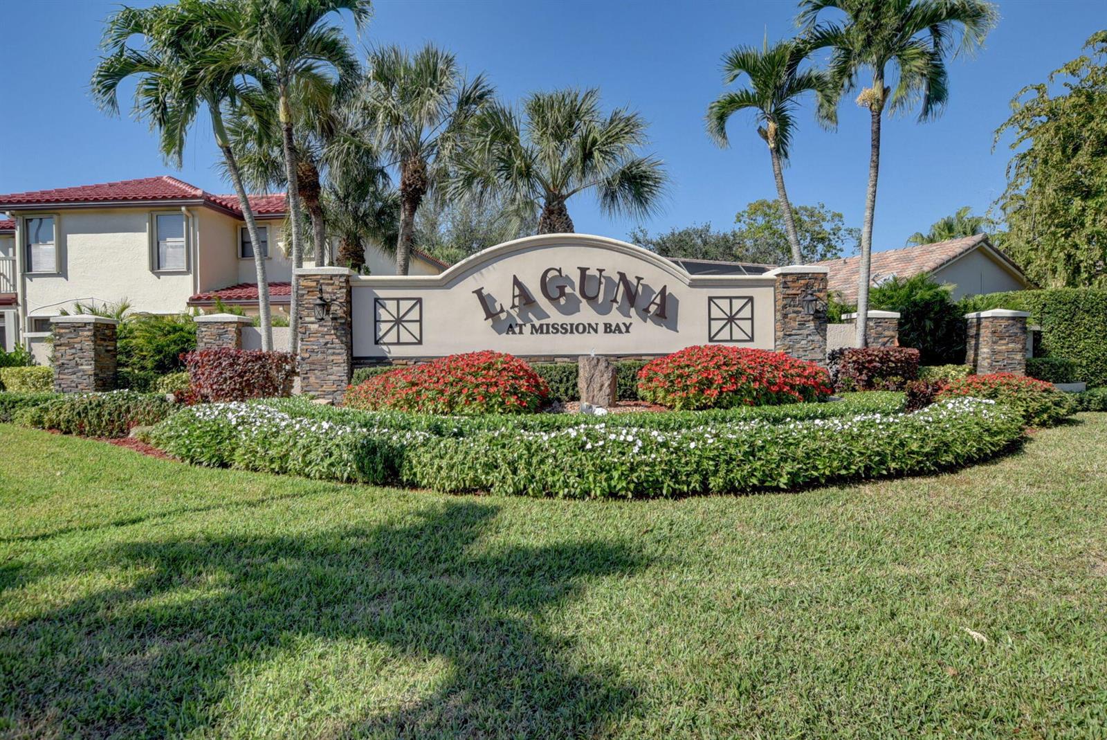 A stone monument sign for Laguna at Mission Bay sits in a landscaped residential yard — 20803 Cabrillo Way, Boca Raton FL 33428, BOCA RATON, FL