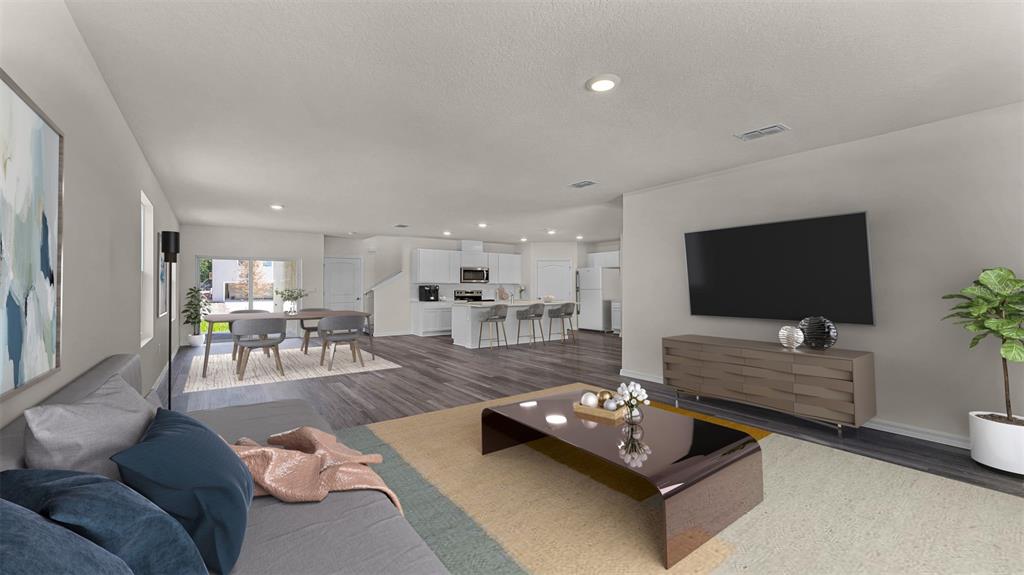 This digital rendering shows an open-concept living and dining area with modern furniture and flooring — 5174 BLANKET FLOWER STREET, APOPKA, FL