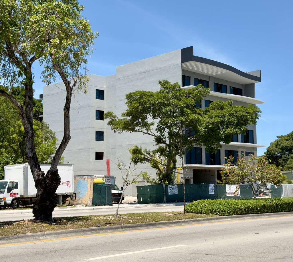 A multi-story building under construction with a white exterior and dark window frames — 4110 NW 22nd Avenue # 1, Miami FL 33142, MIAMI, FL