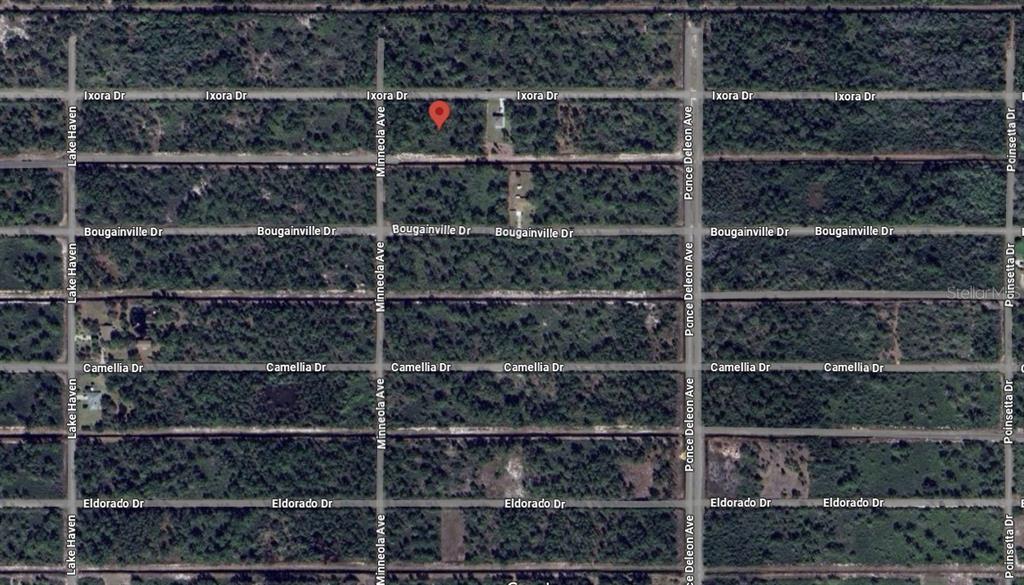 This is an aerial map view of a wooded residential area with grid-patterned streets — 421 AZALEA DRIVE, INDIAN LAKE ESTATES, FL