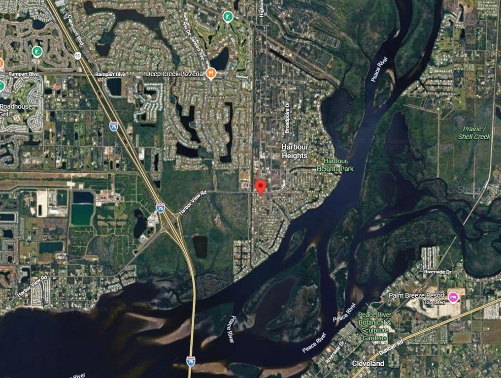 This is a satellite map showing the Peace River area near Harbour Heights, Florida — 3148 HIGHLANDS ROAD, PUNTA GORDA, FL