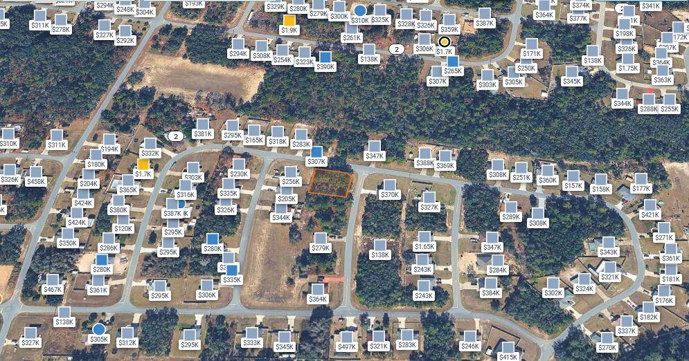 This is an aerial map view of a residential neighborhood with highlighted property values — 00 SW 133 Loop, Ocala FL 34473, OCALA, FL