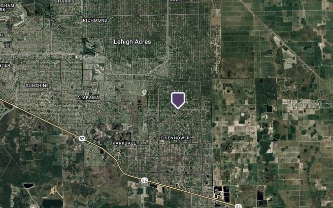 This is a satellite map showing a residential area in Lehigh Acres, Florida, with a marker — 357 NATHAN AVENUE, LEHIGH ACRES, FL