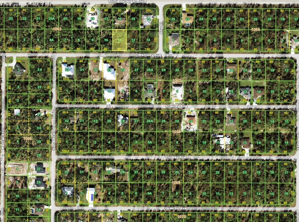 This is a land survey map showing residential lots and street layouts — 17394 WELLSLEY AVENUE, PORT CHARLOTTE, FL