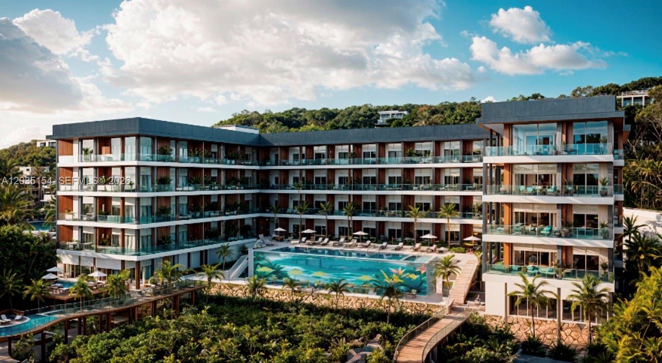 This is a rendering of a multi-story hotel building featuring a large swimming pool — 1 Turtle Crossing, FL 000000, FL
