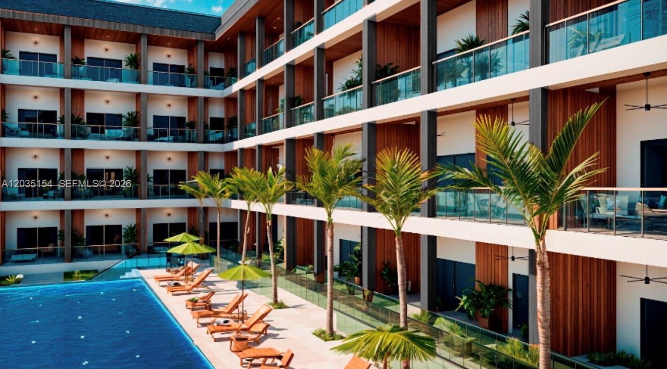 This rendering shows a modern multi-story hotel courtyard with a swimming pool and palm trees — 1 Turtle Crossing, FL 000000, FL