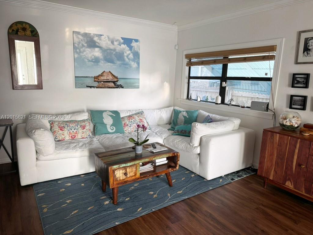 A living room features a white sectional sofa, a wooden coffee table, and a blue rug — 324 SW 3rd Ave, Delray Beach FL 33444, DELRAY BEACH, FL