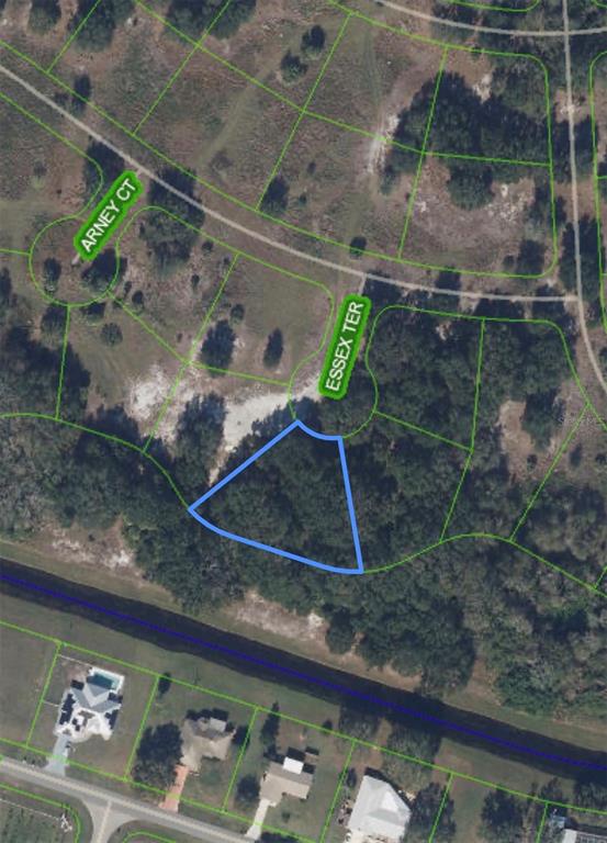 An aerial map view shows a vacant, trapezoidal-shaped residential lot located at a cul-de-sac — 1000 ESSEX TERRACE, SEBRING, FL