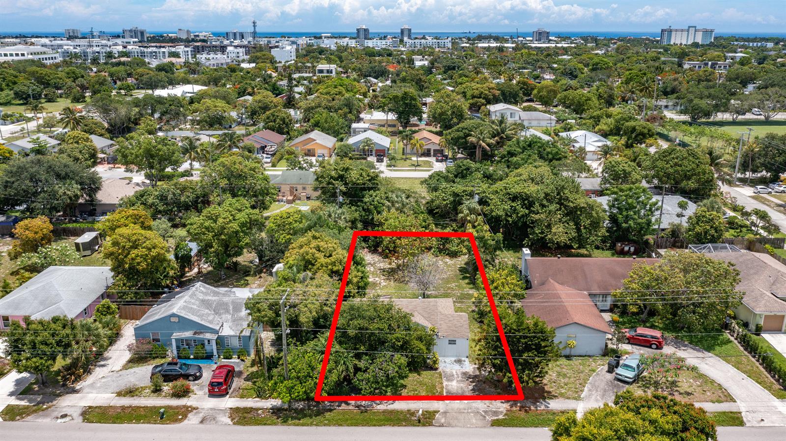An aerial view shows a single-story house on a lot outlined in red — 229 SW 4th Avenue, Delray Beach FL 33444, DELRAY BEACH, FL