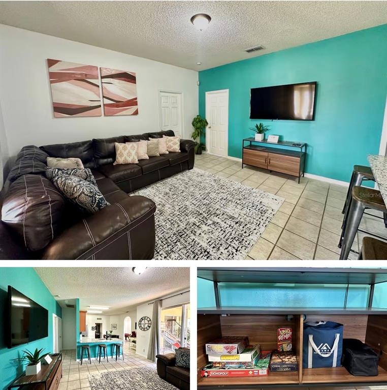 A living room features a brown sectional sofa, a teal accent wall, and a media console — 5212 JASMINE TRACE LANE, KISSIMMEE, FL