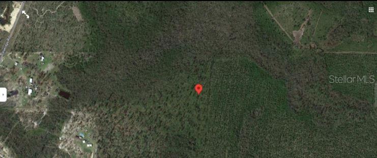 This is an aerial map view of a wooded, undeveloped plot of land — 12241 PINERIDGE ROAD, FOUNTAIN, FL