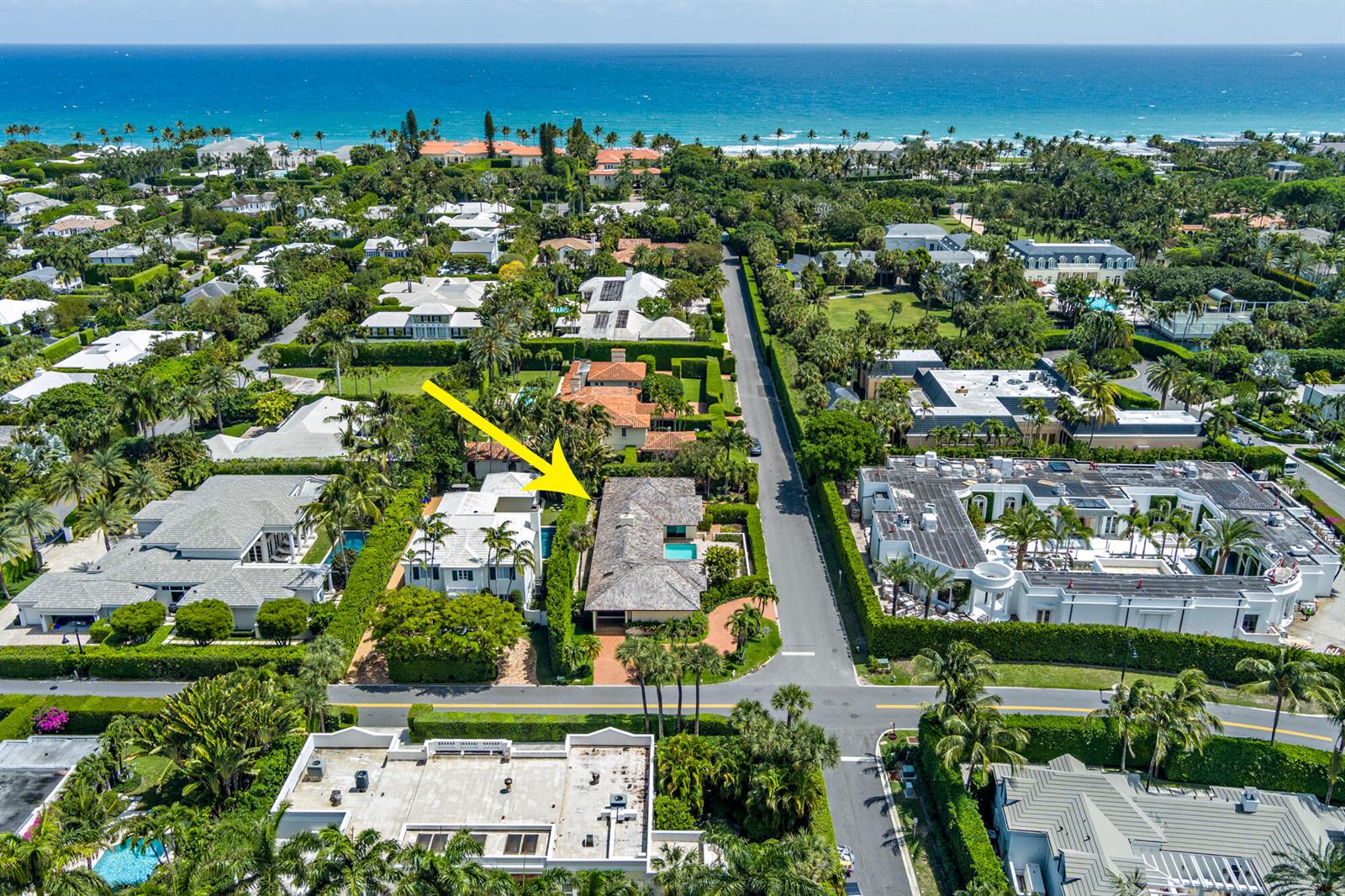 An aerial view shows a residential neighborhood with a yellow arrow pointing to a house — 575 N Lake Way, Palm Beach FL 33480, PALM BEACH, FL
