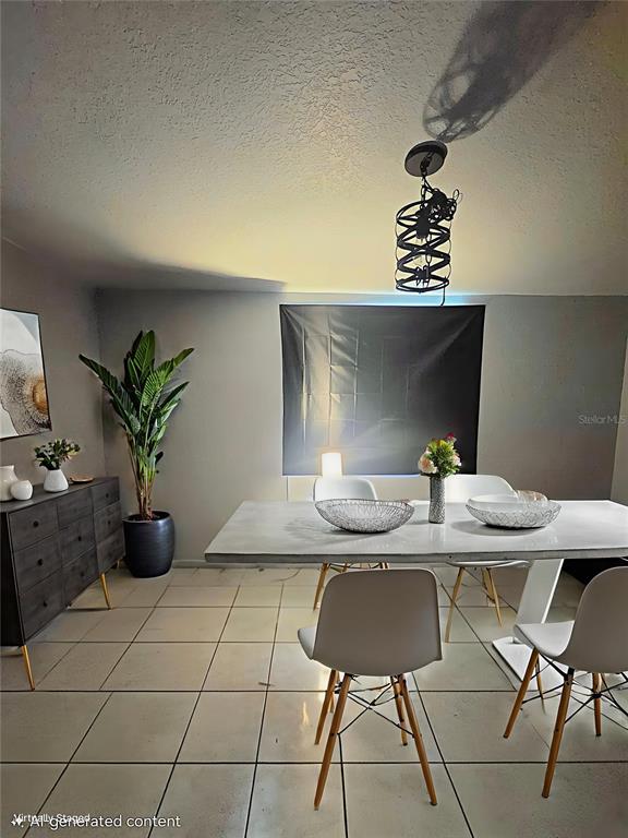 A dining room features a rectangular table, four chairs, a sideboard, and a pendant light — 3007 15TH STREET W, BRADENTON, FL