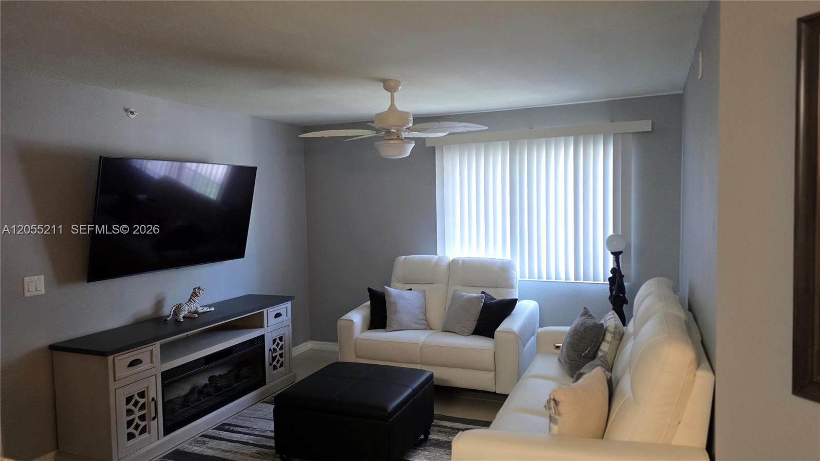 A three-story apartment building with orange and cream stucco walls and a tiled roof — 6769 Heritage Grande # 2201, Boynton Beach FL 33437, BOYNTON BEACH, FL
