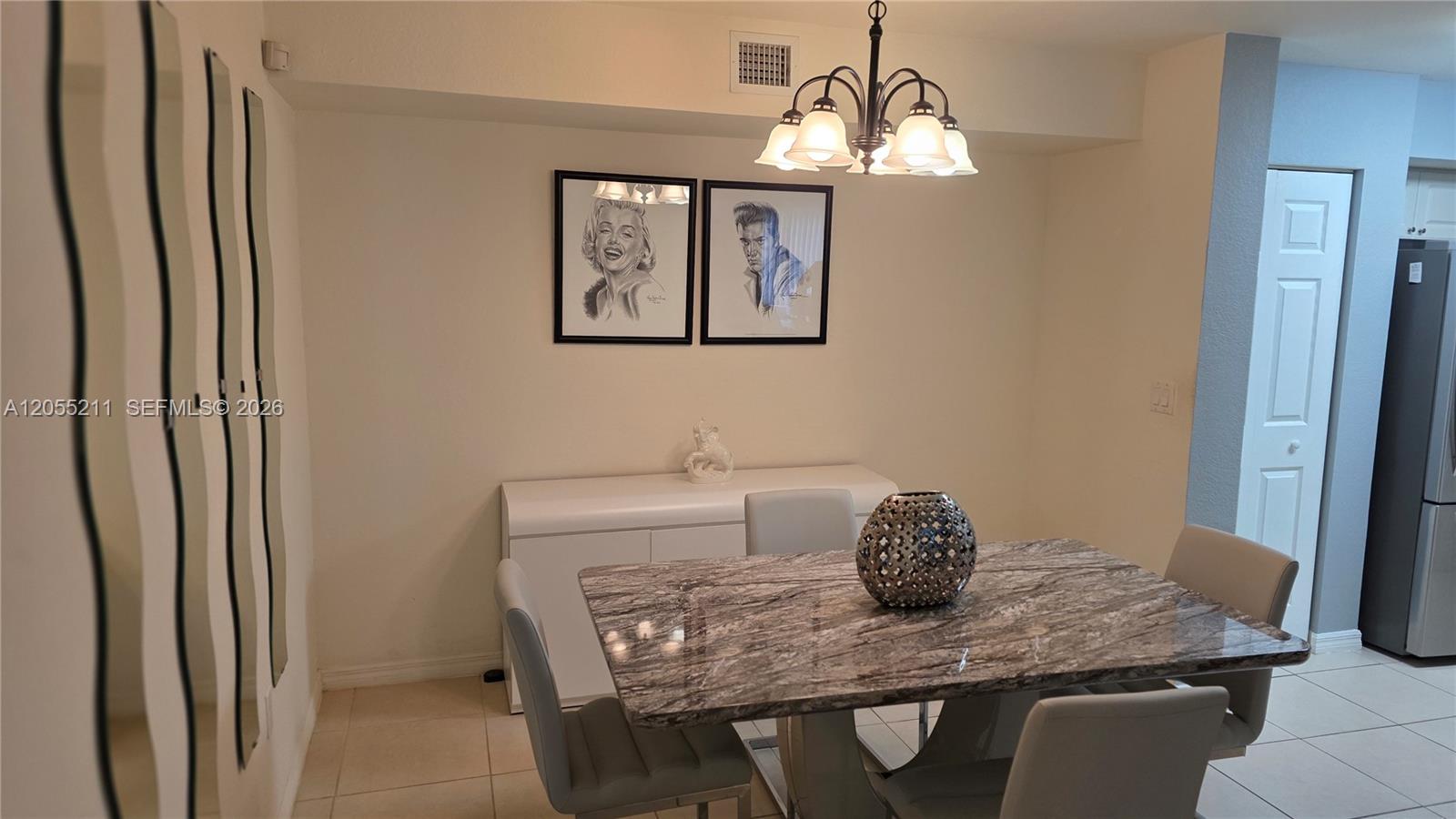 A three-story apartment building with yellow and orange stucco walls and a landscaped hedge — 6769 Heritage Grande # 2201, Boynton Beach FL 33437, BOYNTON BEACH, FL