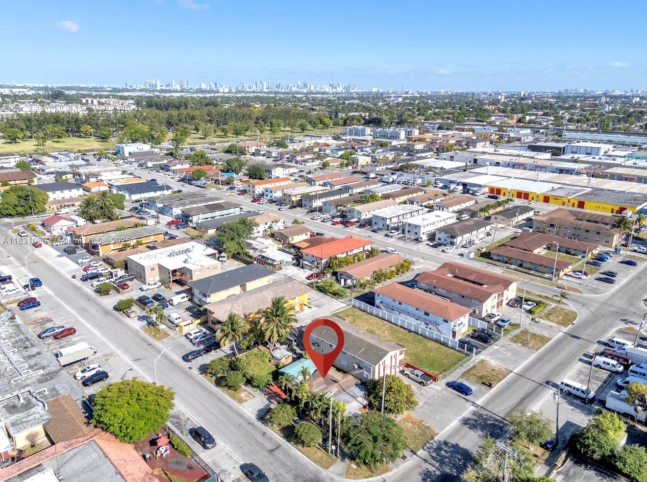 An aerial view shows a residential neighborhood with a red location pin over a house — 190 W 27th St, Hialeah FL 33010, HIALEAH, FL