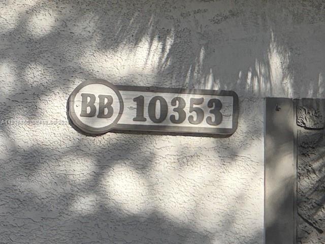 A rectangular sign with the letters BB and the number 10353 mounted on a stucco wall — 10353 N Kendall Dr # 6, Miami FL 33176, MIAMI, FL