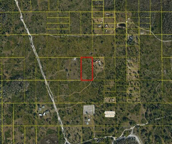 This is an aerial map showing a rectangular parcel of land outlined in red — SUBURBAN ESTS SEC 35...4424 001J, ST CLOUD, FL