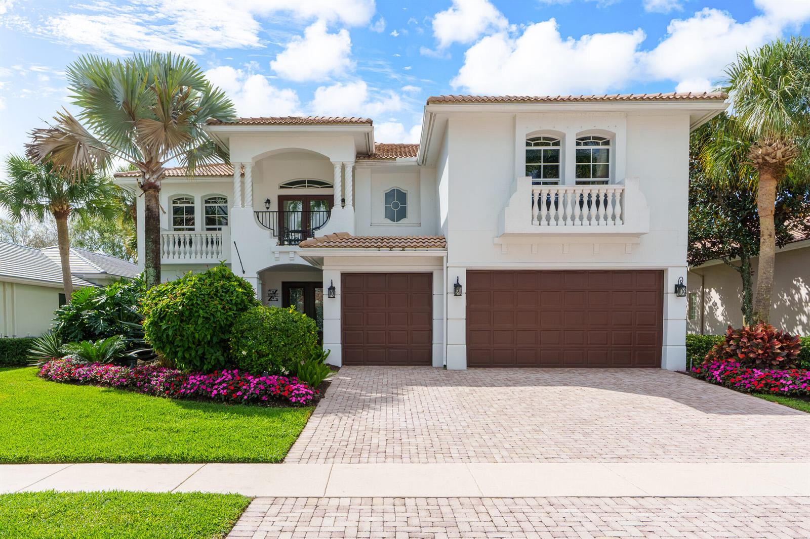 A two-story white stucco house with a brown three-car garage and a paved driveway — 8850 Valhalla Drive, Delray Beach FL 33446, DELRAY BEACH, FL