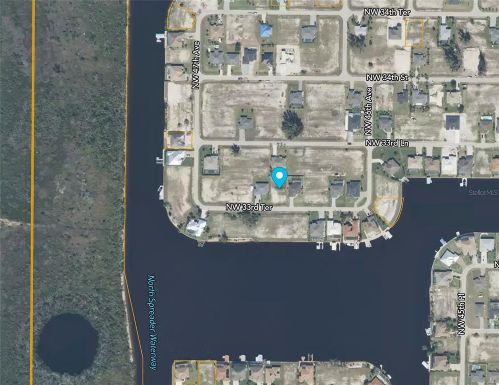 This is an aerial map view of a residential neighborhood with canal-front properties — 4621 NW 33RD TERRACE, CAPE CORAL, FL