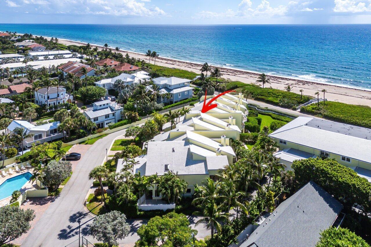 An aerial view of a multi-unit residential building with white roofs near the ocean — 5109 N Ocean E Boulevard, Ocean Ridge FL 33435, OCEAN RIDGE, FL