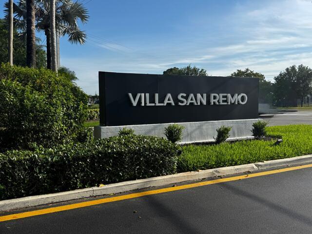 A black sign with white lettering reading Villa San Remo stands near a road — 9708 Erica Court, Boca Raton FL 33496, BOCA RATON, FL