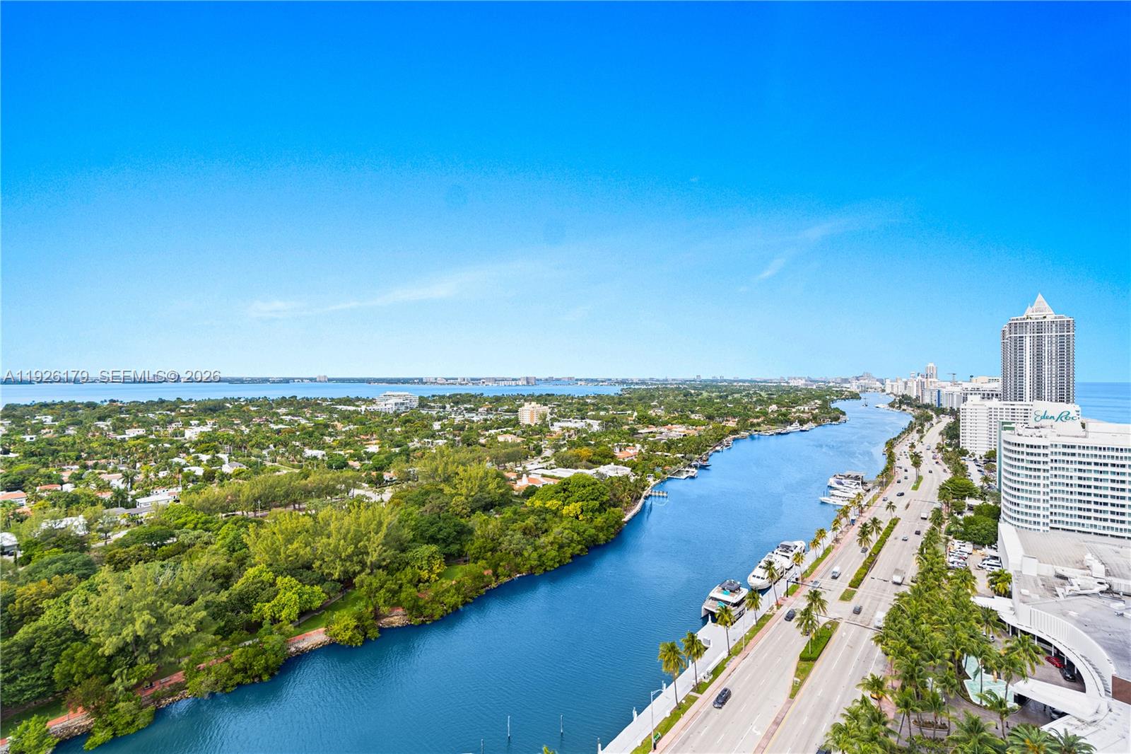 An aerial view shows a coastal waterway, a multi-lane road, and high-rise buildings — 4401 Collins Ave # 2517, Miami Beach FL 33140, MIAMI BEACH, FL