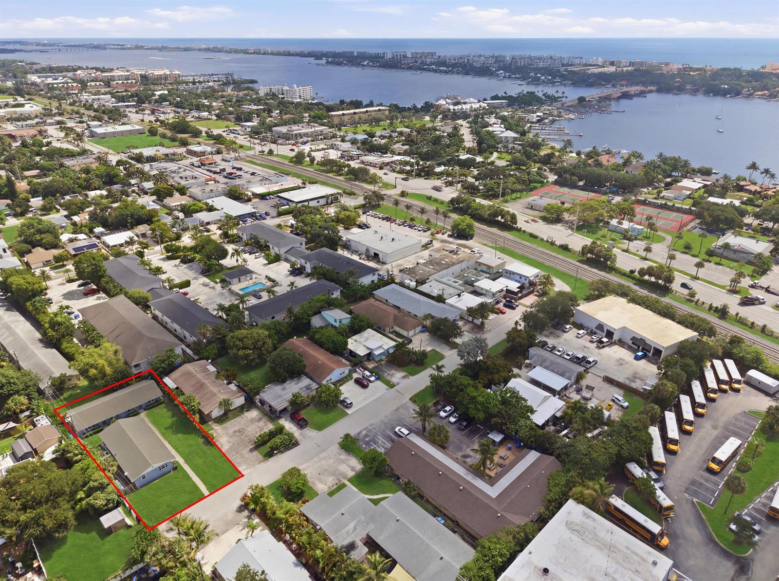 An aerial view shows a residential property outlined in red within a coastal neighborhood — 355 Wickline Boulevard, Lantana FL 33462, LANTANA, FL