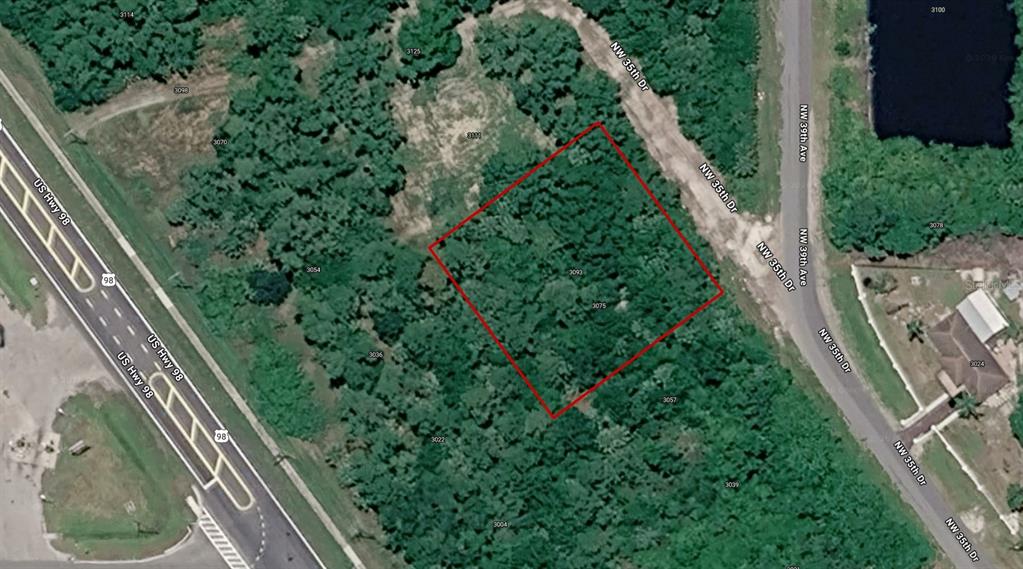 This is an aerial map view of a wooded, rectangular plot of land — 3093 NW 35TH DRIVE, OKEECHOBEE, FL
